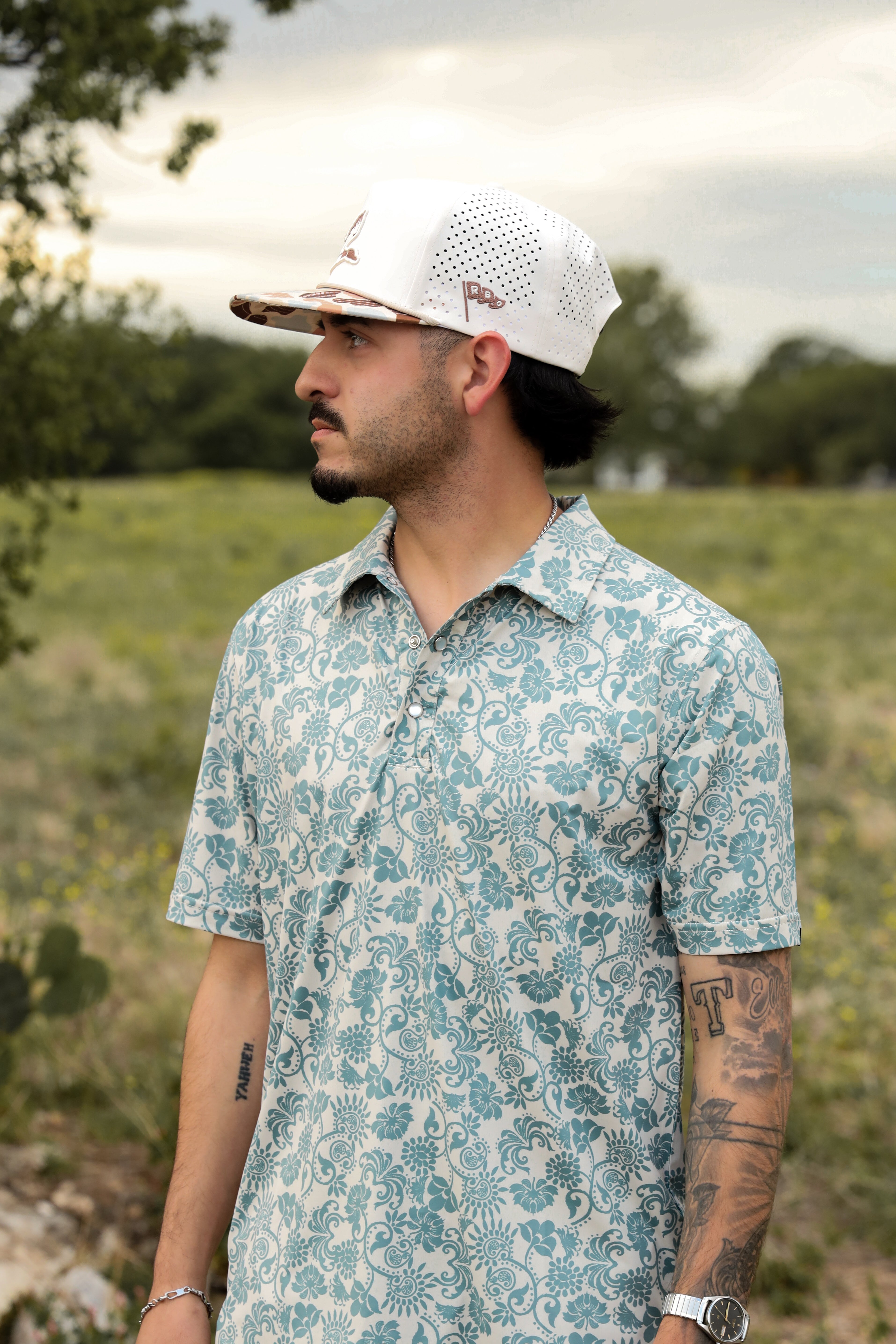 The Magnolia Pearl Snap Polo