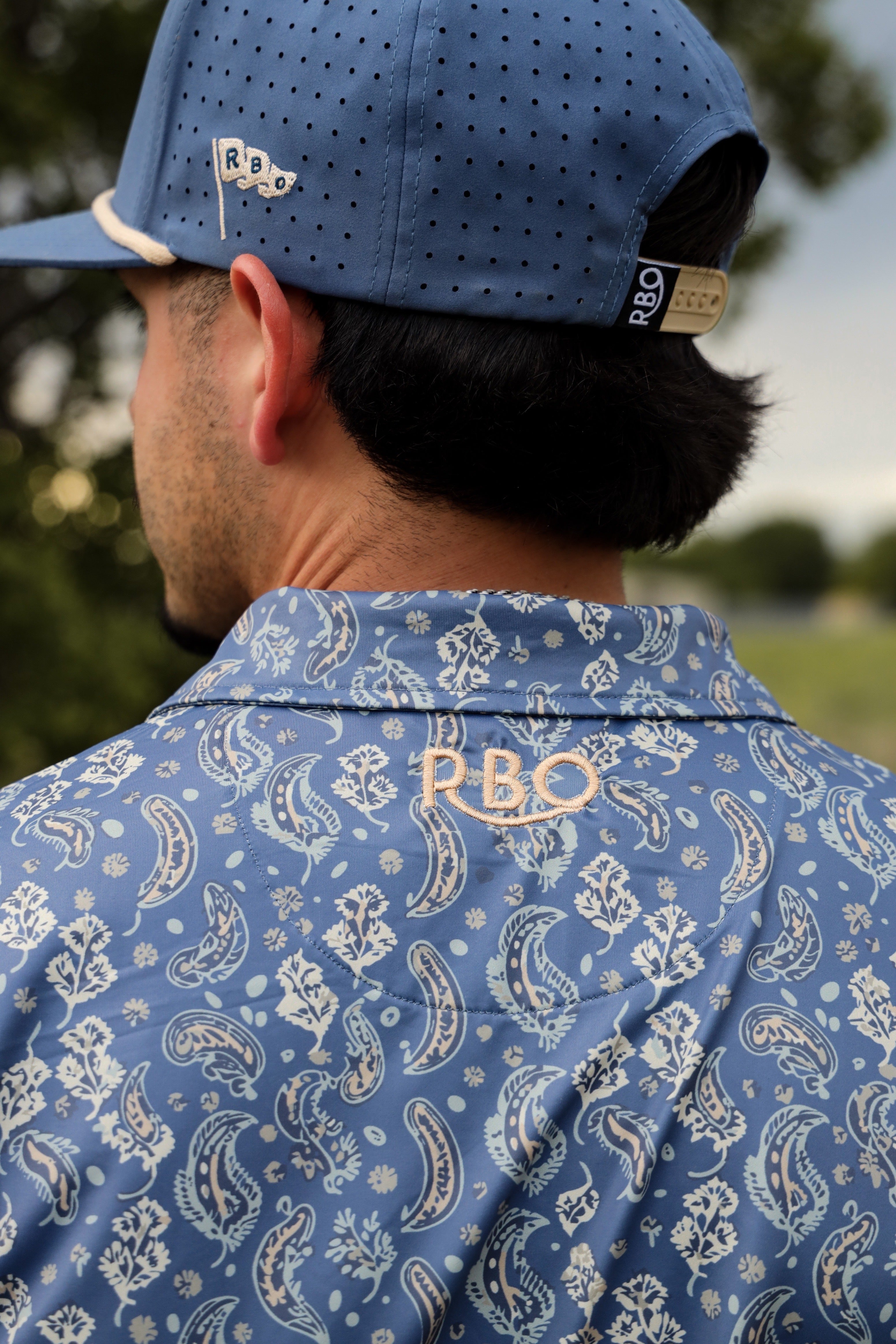 The Daybreak Pearl Snap Polo