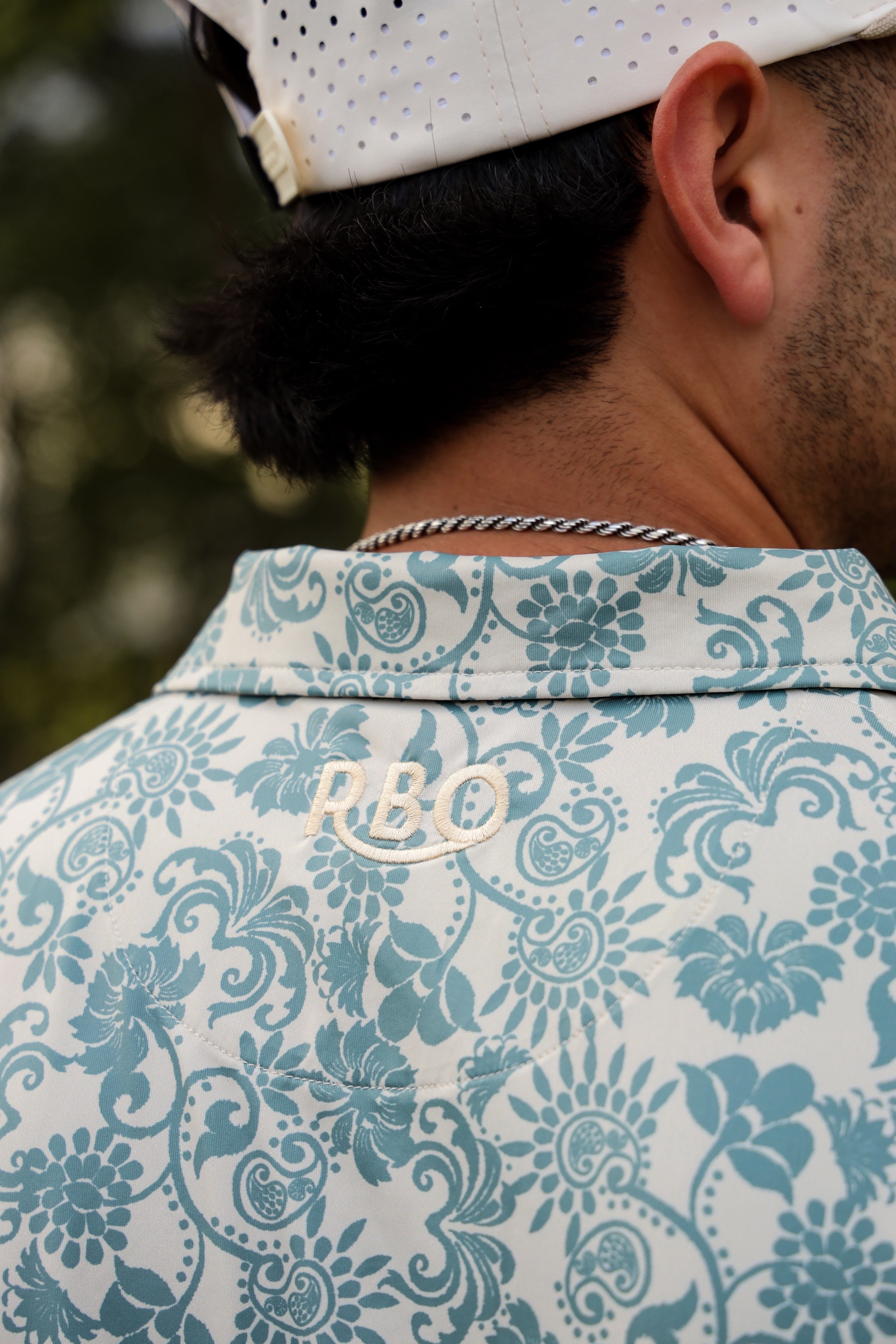 The Magnolia Pearl Snap Polo