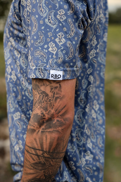 The Daybreak Pearl Snap Polo