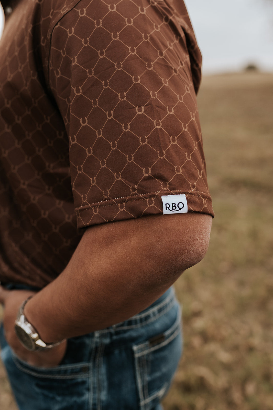 The Bronc Pearl Snap Polo